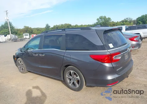 2020 Honda Odyssey Touring z USA, uszkodzony, nr VIN 5FNRL6H83LB033947